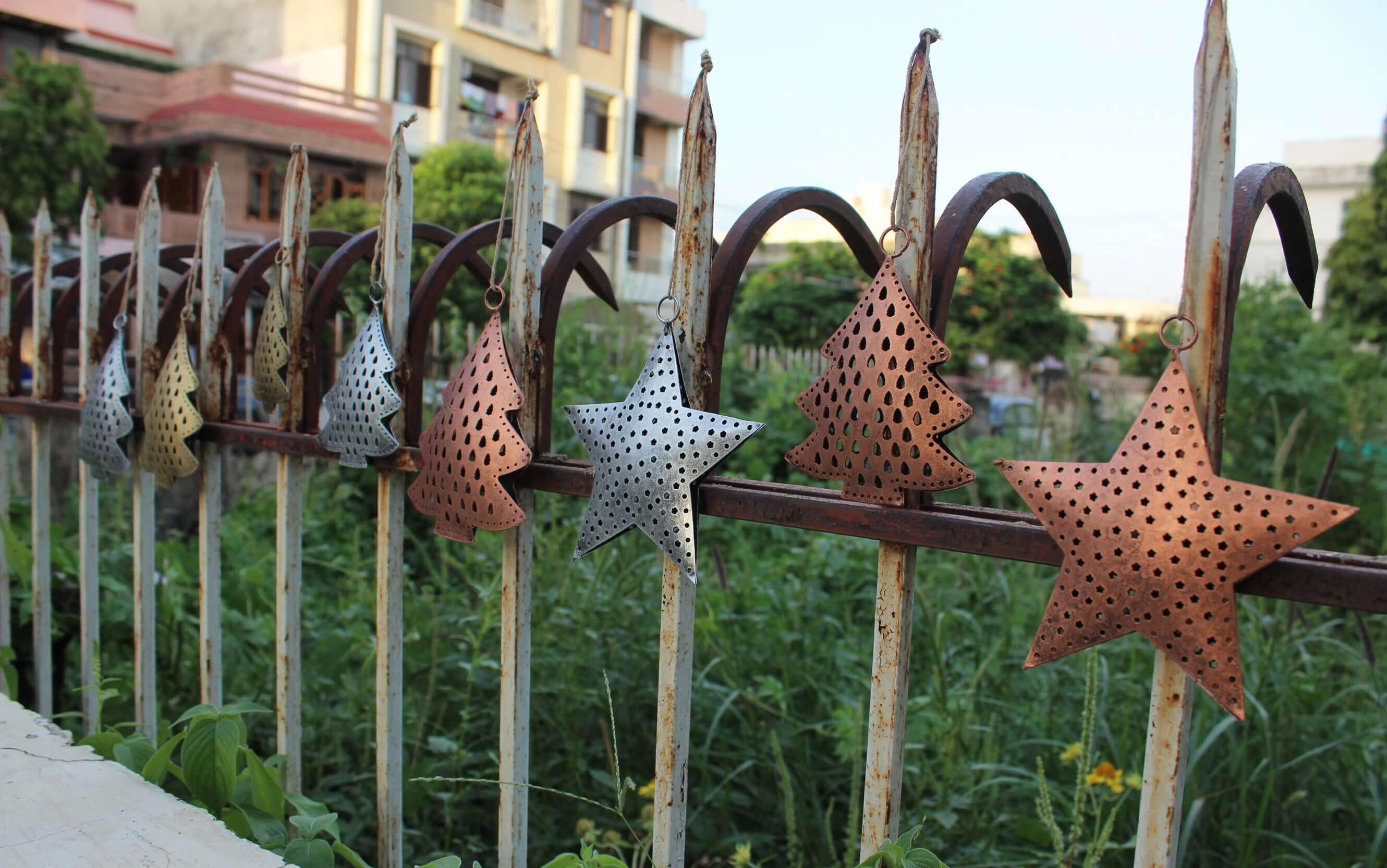 Festive recycled iron ornaments with unique designs. Durable, lightweight, and perfect for your Christmas tree decor!